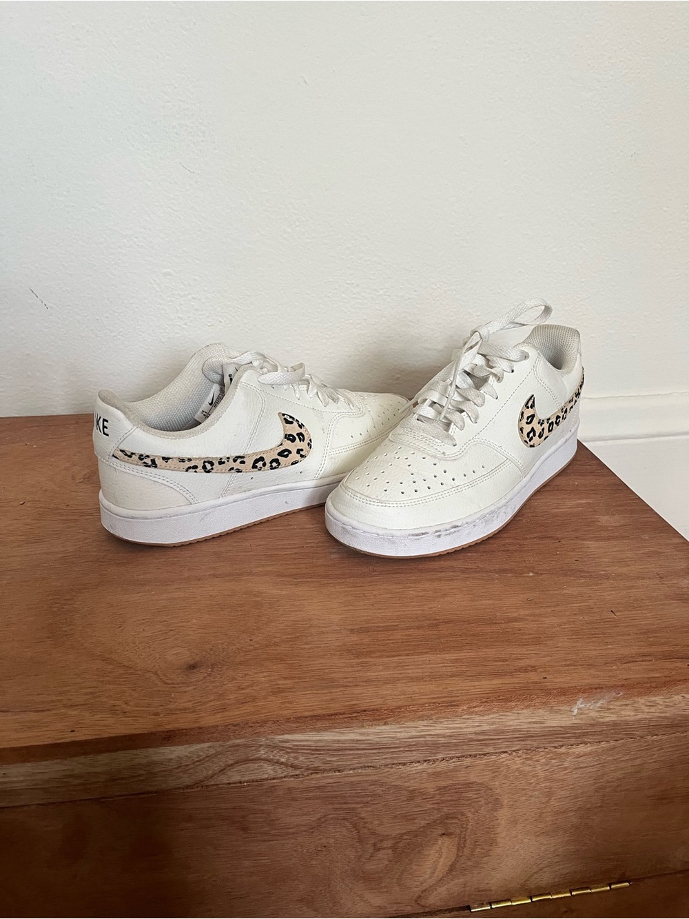 Nike White Low-Top Sneakers with Leopard Swoosh